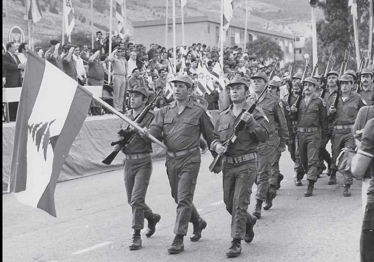 A unit from the South Lebanon Army marches in a Yom Ha’atzmaut parade in Kiryat Shmona in 1982.