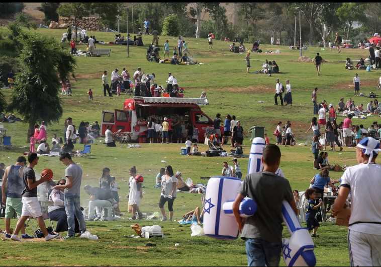 Celebrators head in to Jerusalem’s Sacher Park last year where barbecues and festivities are held throughout Independence Day.