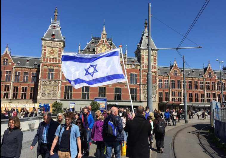 A fellow church member walking through Amsterdam with the Israeli flag