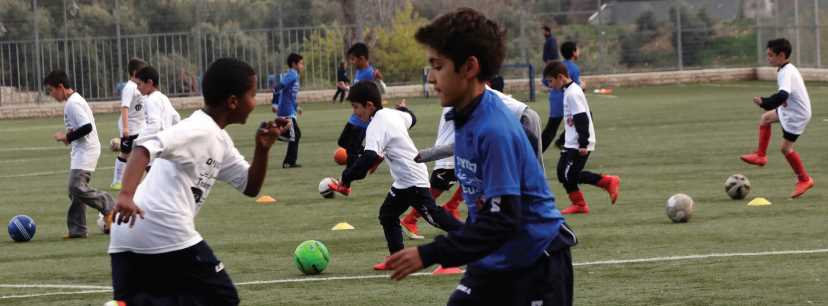 Jewish and Arab children take part in Katamon’s school activity.