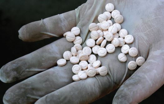 A customs officers displays confiscated Captagon pills