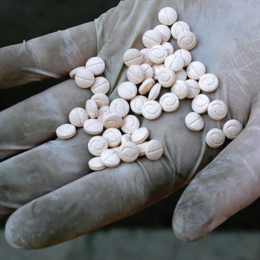 A customs officers displays confiscated Captagon pills