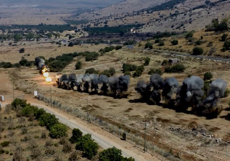 A controlled explosion of mines on the Golan Heights