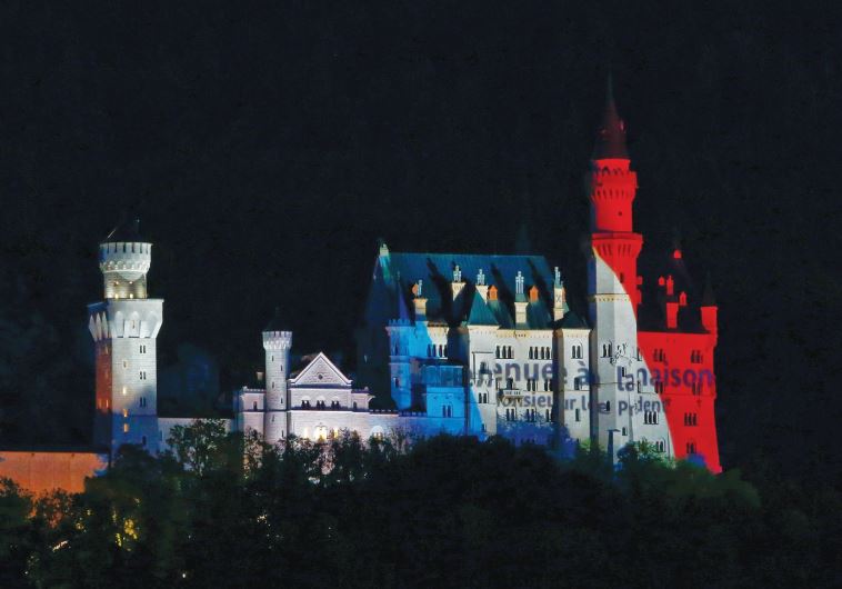 A CASTLE in Bavaria is illuminated in the tri-color. The author argues that terrorism seeks to bring the world back to the dark ages, when castles and human existence was brutish and religious zeal dictated the pattern of violence and life.