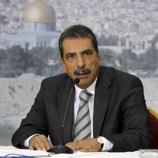 Tawfiq Tirawi speaks during a news conference in the West Bank city of Ramallah