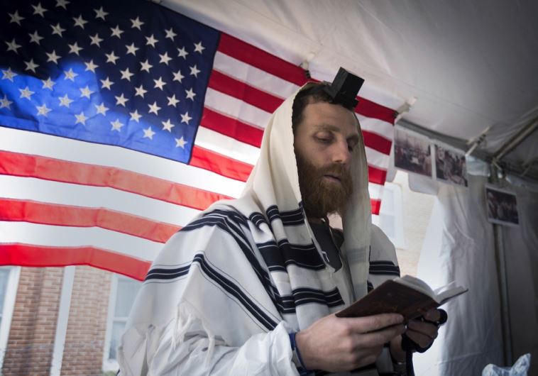 An American Jewish man praying