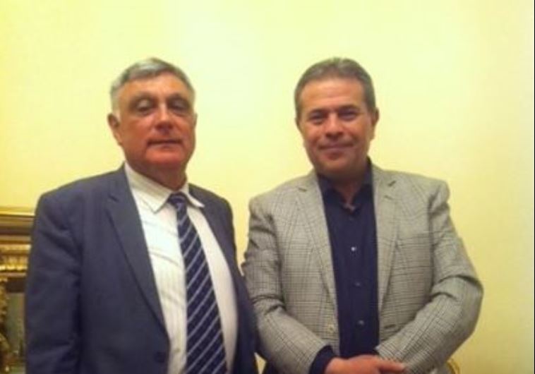 MP Tawfik Okasha (right) hosts Israeli ambassador Haim Koren
