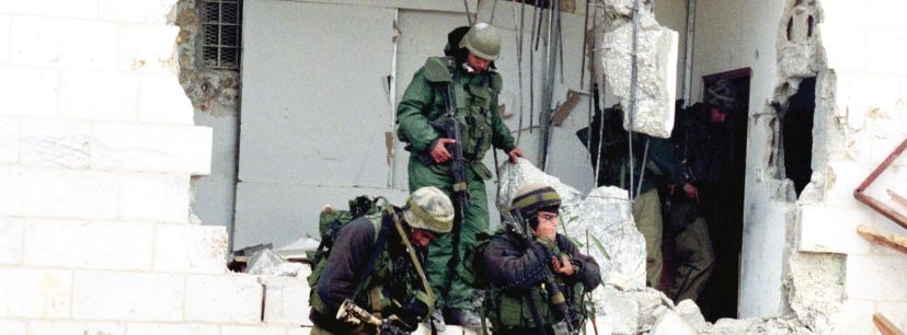 IDF soldiers maneuver in Ramallah during Operation Defensive Shield in 2002