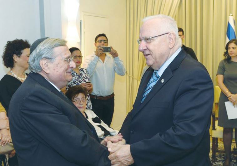PRESIDENT REUVEN RIVLIN (right) congratulates former Supreme Court justice Yaakov Turkel yesterday upon his receiving the third annual Distinguished Scholar of Jewish Law award established by the Israel Bar Association.