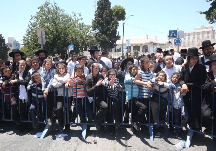 Rabbi Eliezer Berland's followers outside the court Friday July 28, 2016