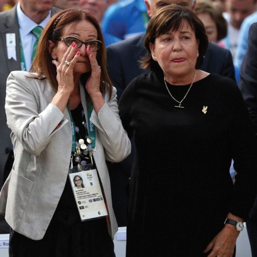 ILANA ROMANO (left) and Ankie Spitzer – widows of two of the murdered Israeli athletes at the 1972 Munich Olympics – attend yesterday’s memorial in Rio.
