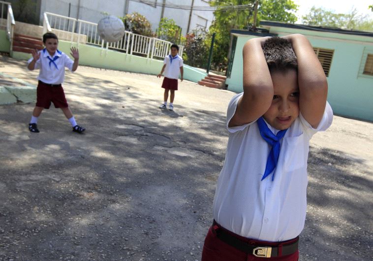 A child with autism plays with other children (file)
