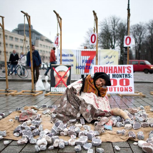 Exiled Iranians protest against executions and stonings in Iran during a demonstration on December 10, 2013 in Berlin (credit: