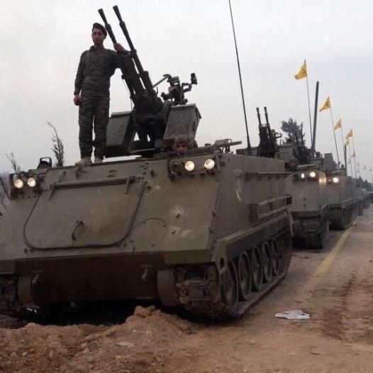 Hezbollah’s first-ever military parade on foreign soil, held in the Syrian city of Qusayr.