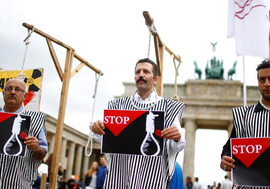 People stage a protest against the execution by Iran of up to 20 Kurds.