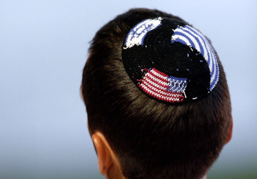 A member of the Jewish community wears a kippa