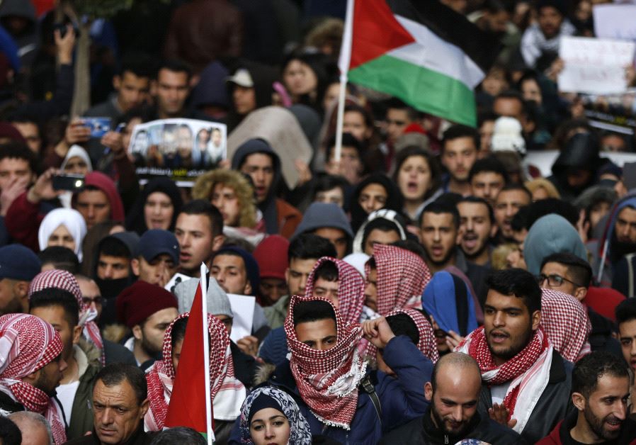 Palestinians demonstrate in the centre of the West Bank city of Ramallah against PA security forces