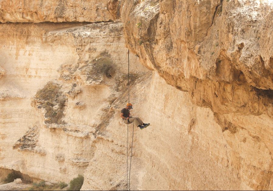 A person rappelling