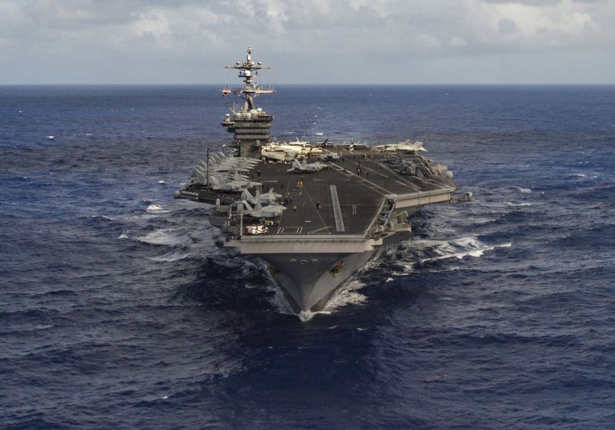 The aircraft carrier USS Carl Vinson (CVN 70) transits the Pacific Ocean January 30, 2017. US Navy Photo by Mass Communication Specialist 3rd Class.