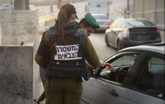 Soldiers of the IDF's Taoz Battalion at checkpoints between Israel and the West Bank