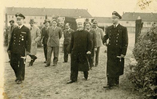 Haj Amin al-Husseini pictured visiting an unnamed German camp during World War II.
