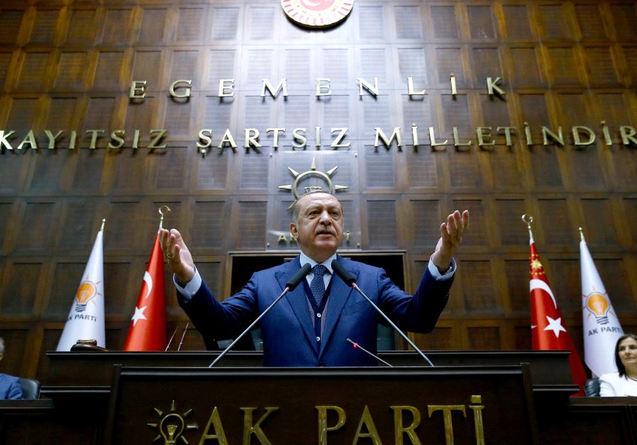 Turkish President Tayyip Erdogan addresses members of parliament from his ruling AK Party (AKP) during a meeting at the Turkish parliament in Ankara, Turkey, June 13, 2017.