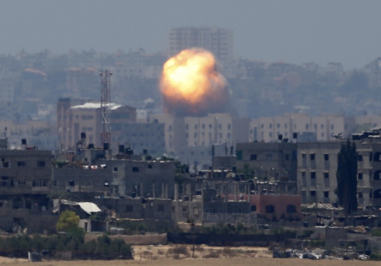 An explosion is seen after an air strike in northern Gaza