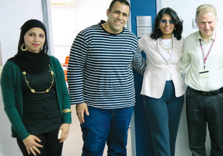 Medical students of the Technion with Dr. Zaher Azzam (center), vice dean for academic affairs, meet with Dr. Qanta Ahmed.