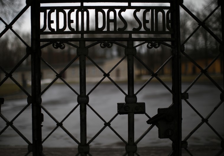 The camp gate with the inscription "to give each his due" is pictured at former concentration camp Buchenwald near Weimar 