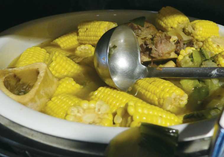 Beef Shank soup with corn and baby bok choy.