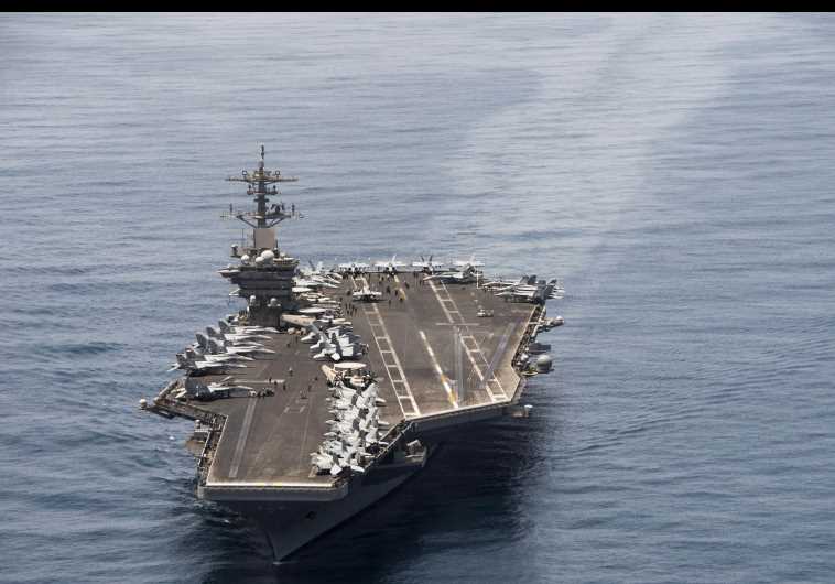 The aircraft carrier USS Theodore Roosevelt operates in the Arabian Sea conducting maritime security operations in this US Navy photo taken April 21, 2015.