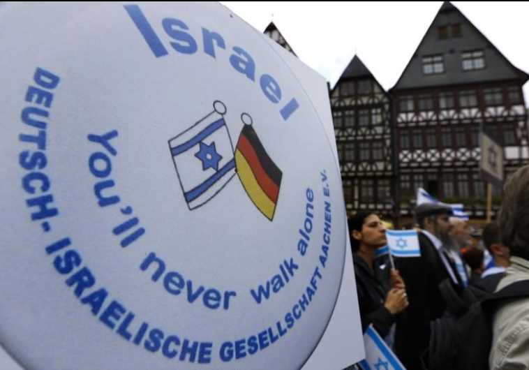 Protesters attend a rally against anti-Semitism in Frankfurt