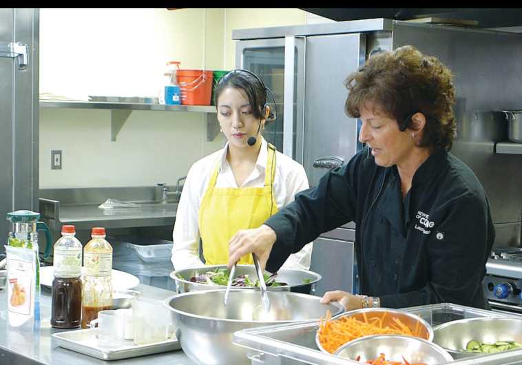 Chef Laura Weinman making glazed salmon salad; with Valerie Hwang.