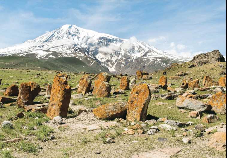 Mount Ararat overlooking a field of eroded khachkars (Armenian cross-stones) in Western Armenia, from the book ‘100 (1915-2015)'.