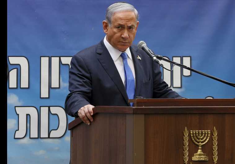 Prime Minister Benjamin Netanyahu speaks during a Memorial Day ceremony on Mount Herzl military cemetery in Jerusalem