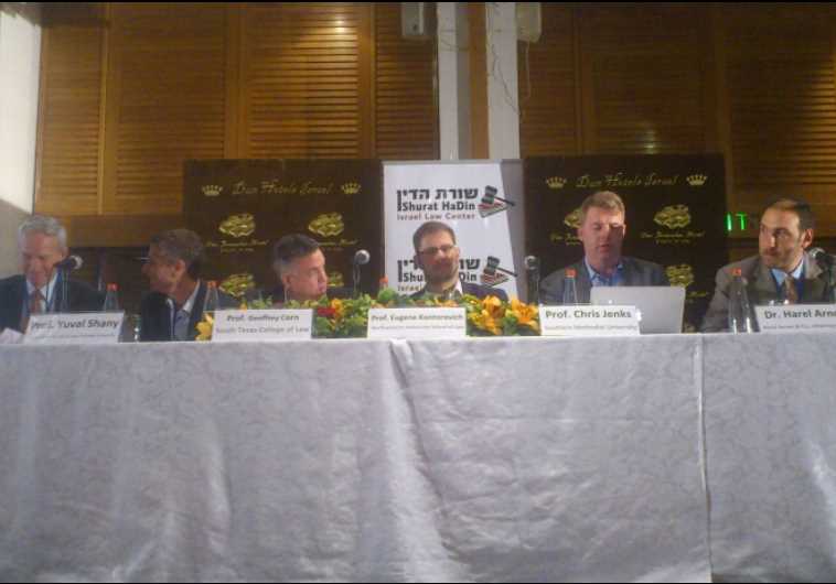 PROF. ROBBIE SABEL (far left) sits with fellow panelists yesterday at the Shurat Hadin conference in Jerusalem