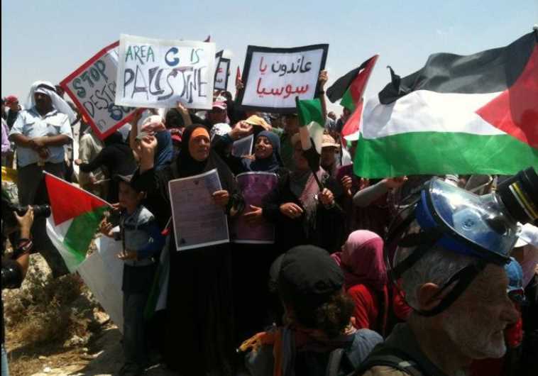 Palestinians demonstrate against the demolition of the village Sussiya by Israel, June 2012
