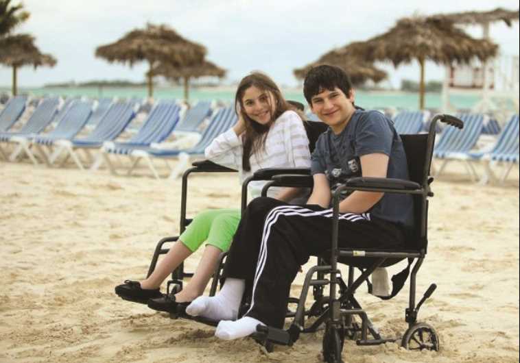 TZVI AND RACHELI Herzfeld enjoy a day at the beach