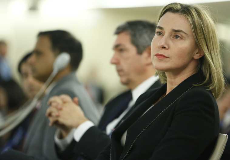 European Union foreign policy chief Federica Mogherini prepares to address the 28th Session of the Human Rights Council at the United Nations in Geneva