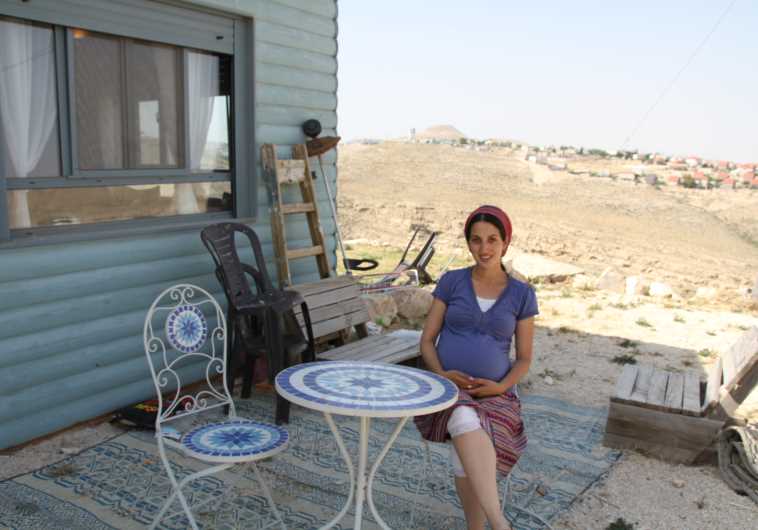 Tehila Makover outside her home in the West Bank outpost of Tekoa D. 