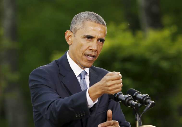 US President Barack Obama speaks during a news conference at Camp David in Maryland May 14, 2015