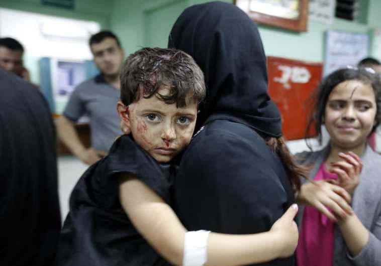 A boy who was injured by an explosion at a Hamas training camp at a hospital in Beit Lahiya, Gaza