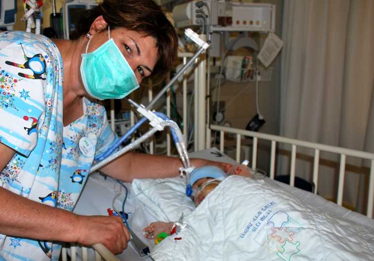 Schneider courtesy photo of baby after transplant surgery. 