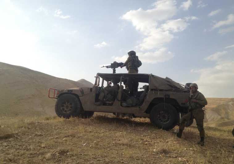 Reconnaissance company members attached to the 401 Armored Brigade use a humvee in an exercise last week