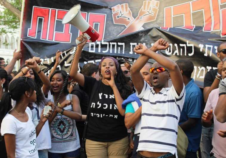 Demonstrators in Tel Aviv gather to protest racism and police brutality, May 18, 2015
