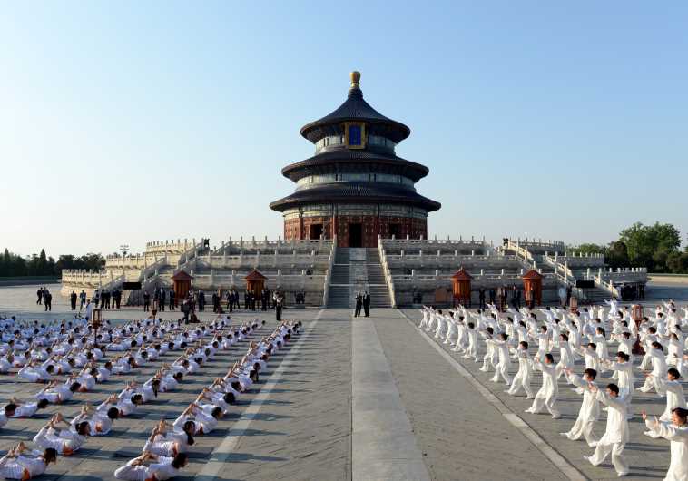 Indian Prime Minister Narendra Modi and Chinese Premier Li Keqiang attend the Taiji and Yoga event at the Temple of Heaven park in Beijing, China on May 15