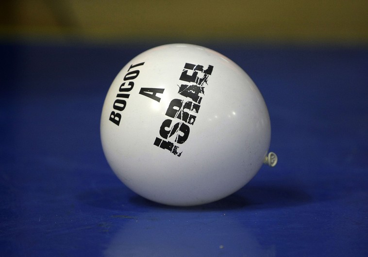 A balloon with the phrase "Boycott to Israel" is seen during a Euroleague basketball game between Maccabi Tel Aviv and Barcelona in Barcelona 