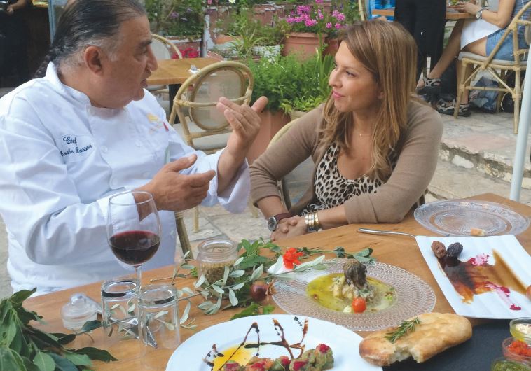 Moshe Basson and Ingrid Hoffmann eat a special meal at Eucalyptus restaurant in Jerusalem Sunday night.
