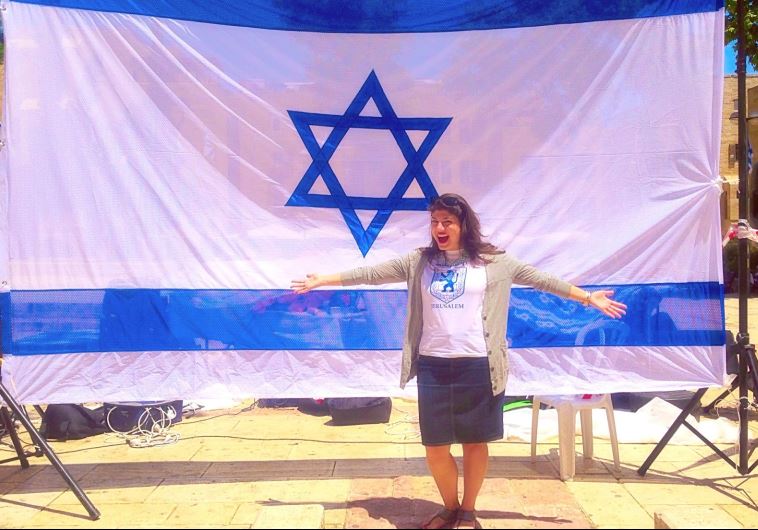 Jordana Brown with an Israeli flag
