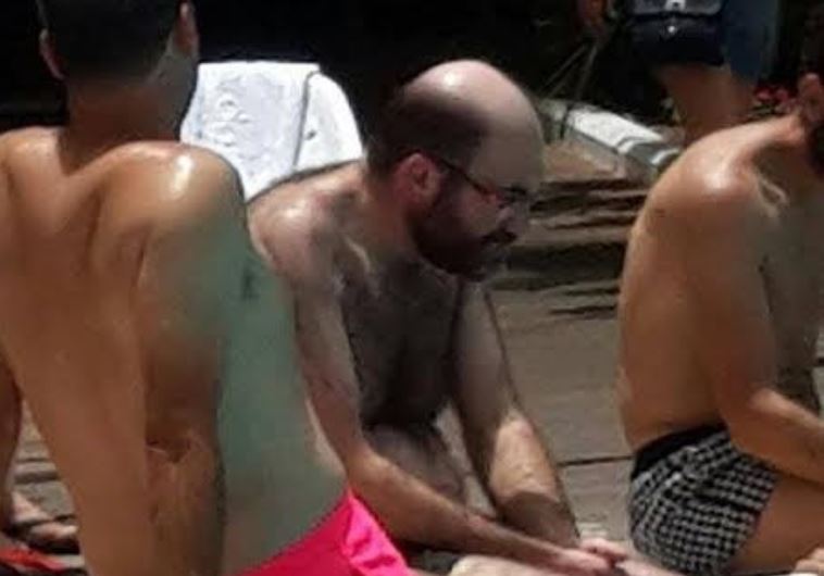 Moshe Montag a city counselor from the Degel HaTorah with women who do not meet his community’s modesty norms